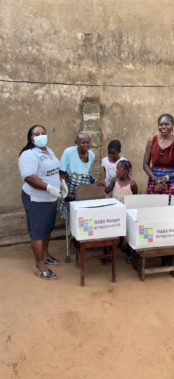 HABA Hunger emergency food relief package being handed to a displaced family in Togo
