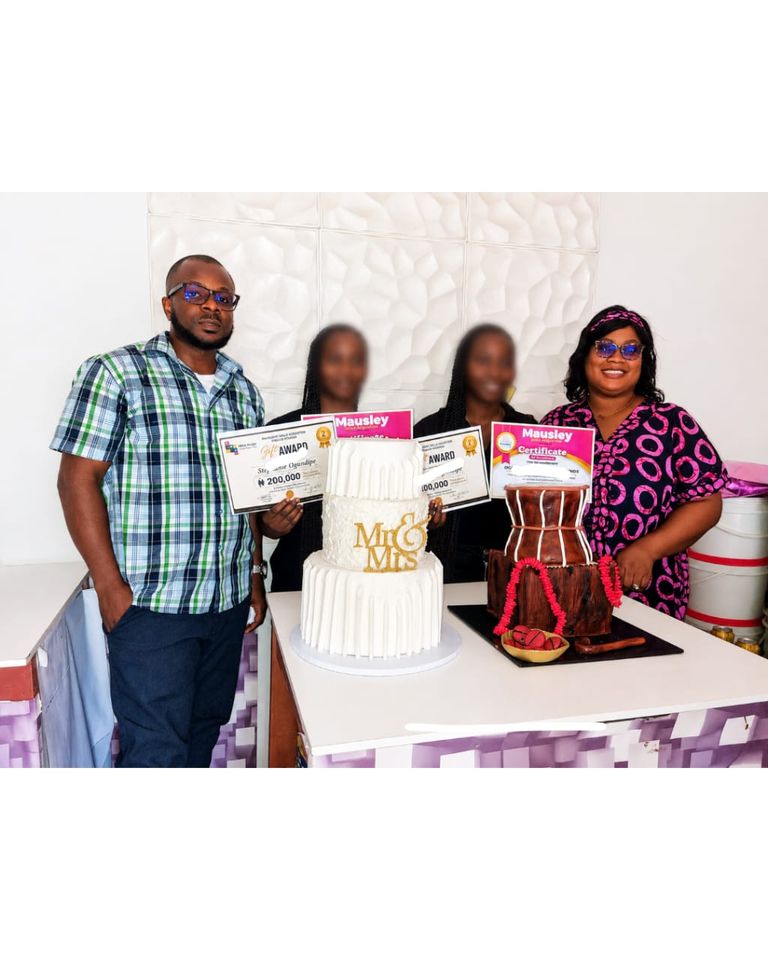 HABA Hunger vocational training beneficiaries displaying certificates beside decorated cakes in Lagos State, Nigeria